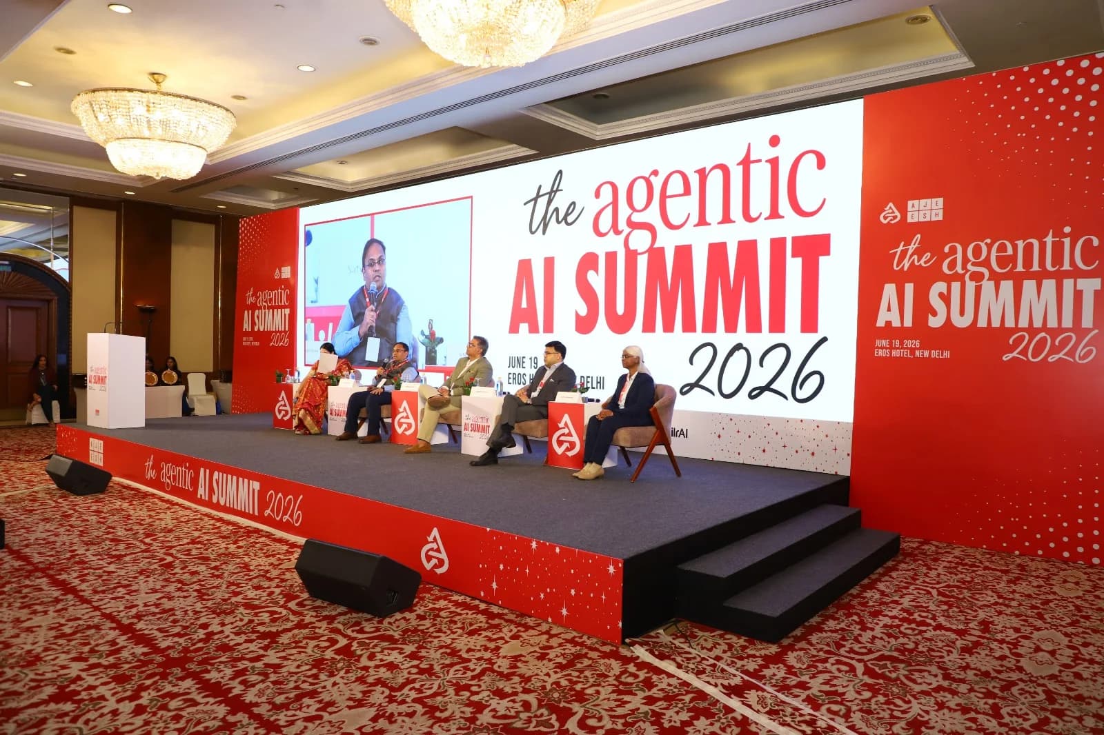 Panel discussion on stage at The Agentic AI India Summit 2026, Eros Hotel, New Delhi.
